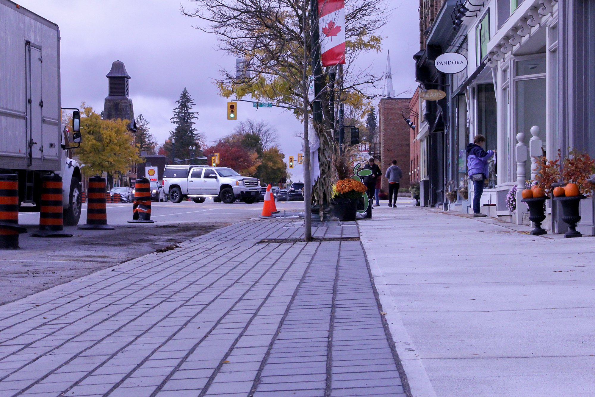 Fresh laid bricks on Broadway in Orangeville. A newly planted line of trees has been completed along the bricks.